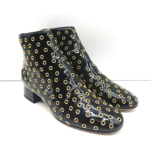 Bottes chelsea RED Valentino à embellissements Gromet en cuir verni noir taille 38