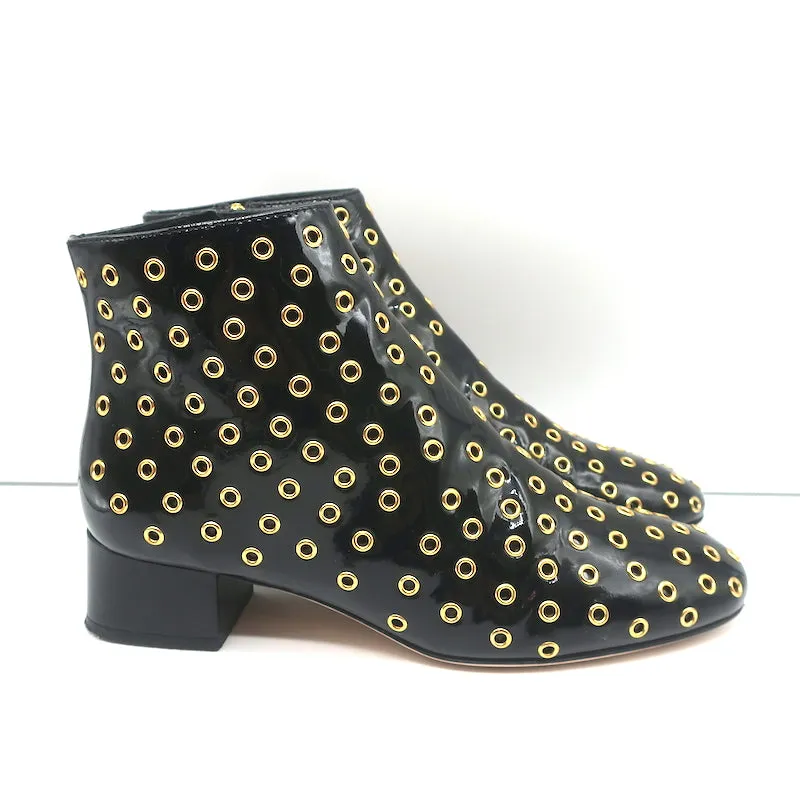 Bottes chelsea RED Valentino à embellissements Gromet en cuir verni noir taille 38
