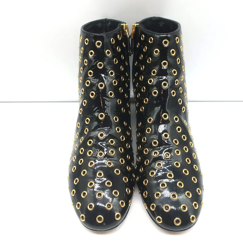 Bottes chelsea RED Valentino à embellissements Gromet en cuir verni noir taille 38