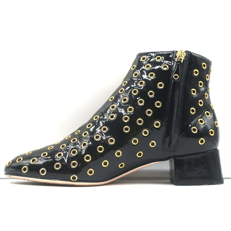 Bottes chelsea RED Valentino à embellissements Gromet en cuir verni noir taille 38