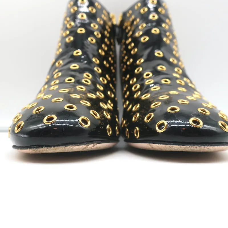 Bottes chelsea RED Valentino à embellissements Gromet en cuir verni noir taille 38