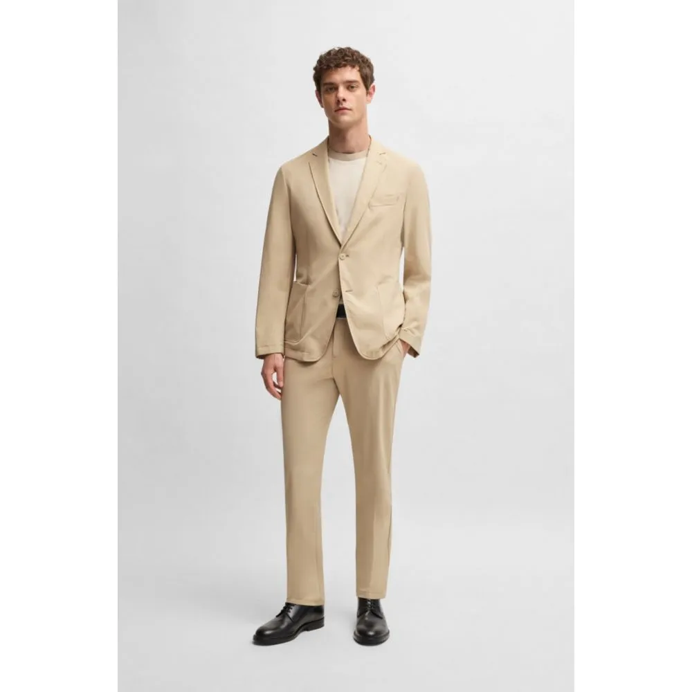 Veste de costume ajustée en softshell extensible, idéale pour les voyages